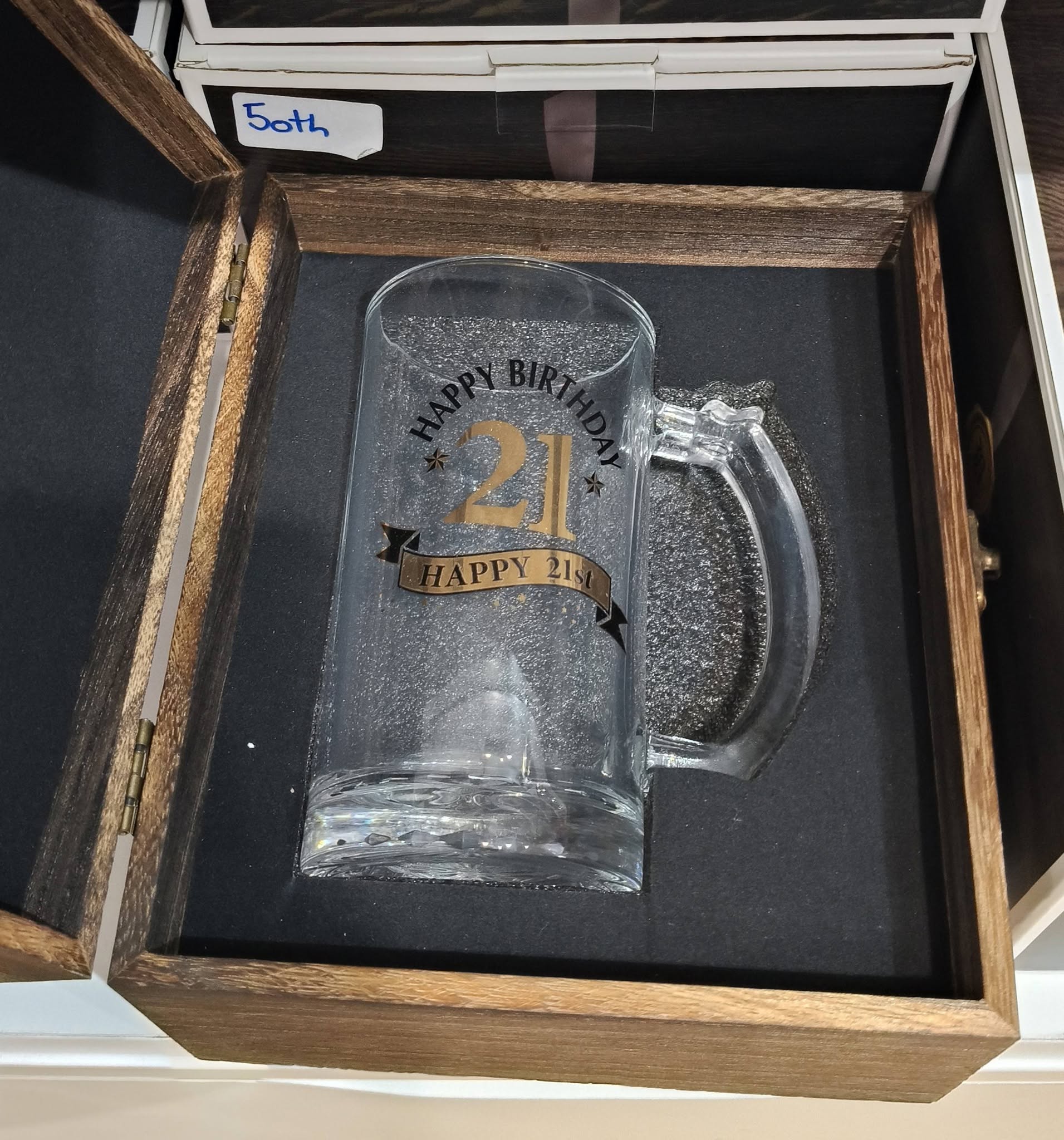 Glass beer stein with a gold 21st birthday design, presented in a wooden gift box